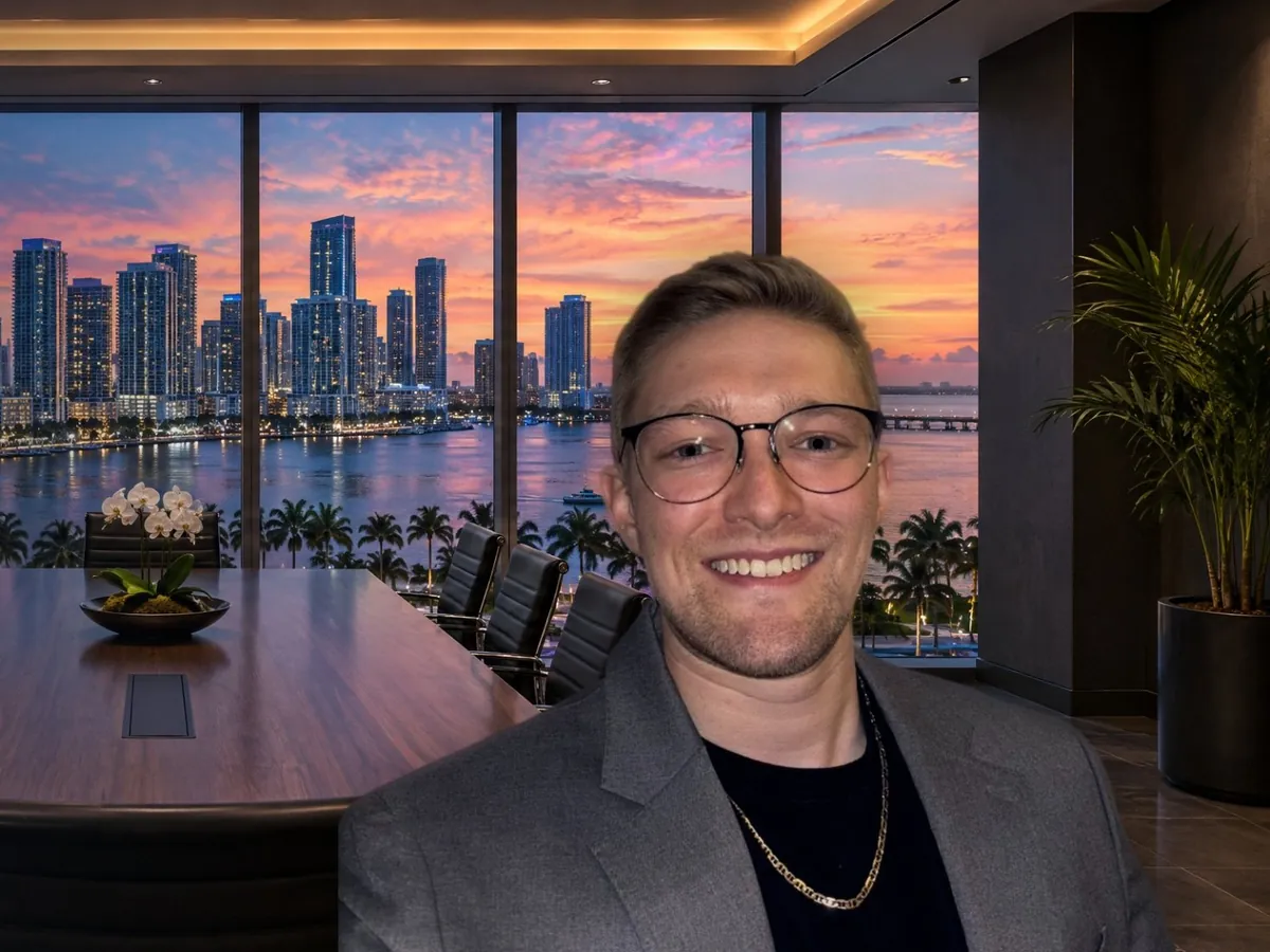 Cole Mello, founder of Altura Marketing Group, with a Florida waterfront skyline at sunset